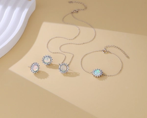 Detailed set of S925 silver sunflower jewelry with opal stones and sparkling zircon pavé