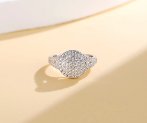 Detailed close-up of S925 sterling silver ring with luxury pavé cubic zirconia cluster