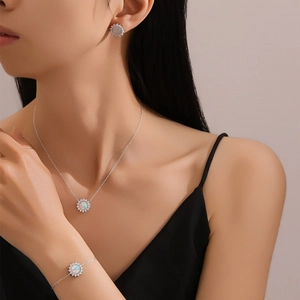 Elegant 925 silver sunflower jewelry set featuring natural opal stones and fine zircon pavé