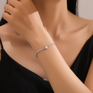 Adjustable S925 sterling silver star bracelet with micro-paved cubic zirconia and pearl