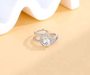 Detailed 45-degree view of silver stacked ring with double pavé band and round center stone