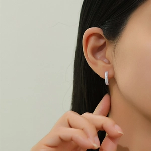 Elegance of S925 sterling silver double hoop earrings with pave diamonds on model
