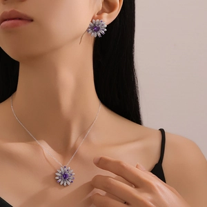 Elegant S925 sterling silver daisy jewelry set with purple stones and micro-pave crystals