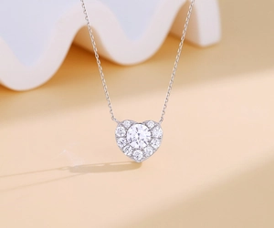 Close-up of heart-shaped 925 sterling silver pendant with large round zircon gemstone