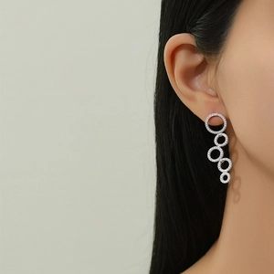 Sparkling multi-circle silver drop earrings with pavé crystals for elegant women