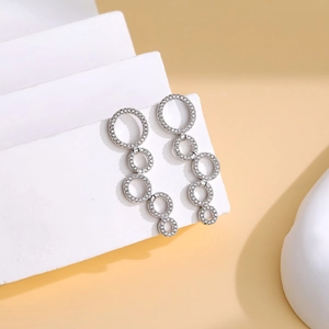 Elegant silver interlocking circle drop earrings with shimmering micro-pave crystals