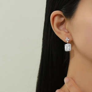 Elegant S925 sterling silver perfume bottle earrings with full pavé diamond clover design
