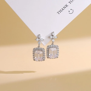 Luxurious S925 sterling silver perfume bottle earrings with emerald cut CZ and pavé diamonds