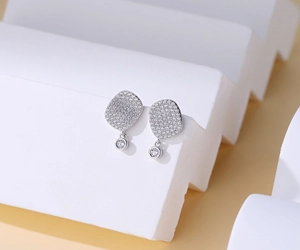 Detail of S925 sterling silver geometric earrings with micro-paved sparkling zircon stones