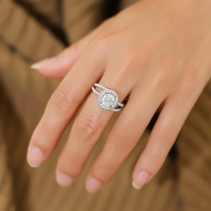 S925 sterling silver halo ring with round diamond and split shank displayed on finger