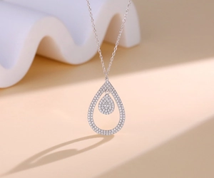Detailed view of S925 silver double teardrop pendant necklace with micro-pave zircons