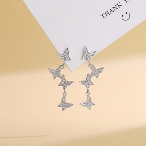 S925 silver butterfly tassel earrings featuring four linked micro-pave butterfly charms