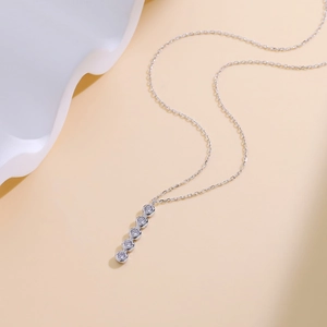 Elegant S925 silver necklace featuring five vertical round zircon stones on a thin chain