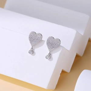 Sparkling S925 sterling silver heart-shaped stud earrings with micro-pave cubic zirconia