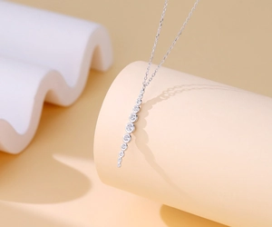 Close-up of S925 sterling silver necklace with a graduated round cubic zirconia tassel