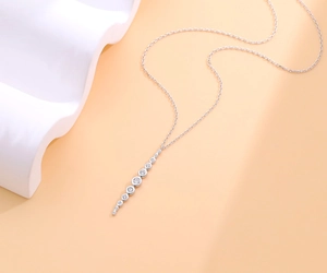 Detailed view of S925 silver necklace featuring a vertical gradient cubic zirconia pendant