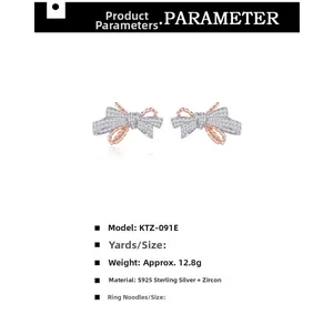 Macro detail of S925 sterling silver bow earrings with pave zircons and bicolor plating