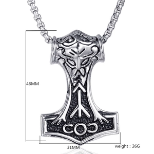 Detail of Thor's Hammer pendant with 46mm height and 31mm width measurement marks