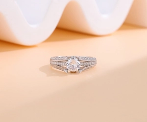 Macro detail of S925 silver ring featuring a 1-carat Moissanite with triple-row pavé band