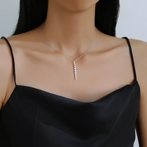 Elegant S925 sterling silver necklace with a sparkling round zircon tassel bar pendant