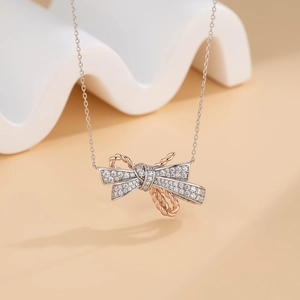 S925 Sterling silver bow necklace with paved diamonds and rose gold accents for women