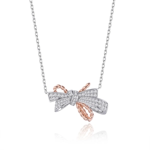 S925 sterling silver bow necklace with pavé crystals and rose gold accents in top view