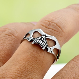 Vintage silver skull mask ring for men in gothic punk style with aged steel finish