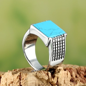 Vintage stainless steel square turquoise ring for men with textured silver band on wood
