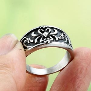 Retro punk titanium steel ring featuring vintage cross and dragon embossed pattern