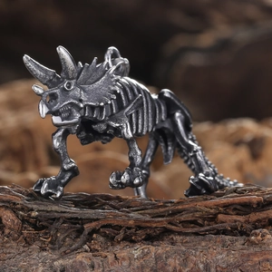 Retro stainless steel triceratops skeleton pendant necklace on rustic wood background