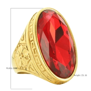 Vintage gold steel ring with large oval red gemstone and greek key floral engravings