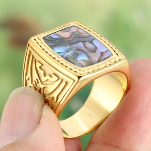 Golden square ring with iridescent abalone shell inlay and vintage floral relief details