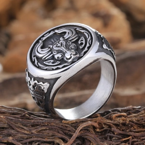 Men's retro stainless steel ring featuring a detailed bull head relief in punk style