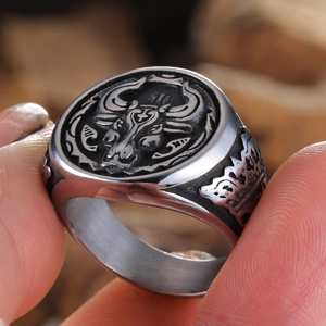 Vintage stainless steel bull head ring with gothic detailing and antique finish