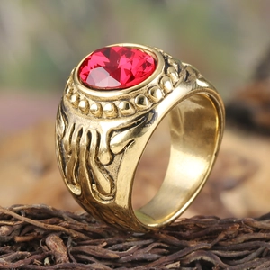 Vintage gold men's stainless steel ring with oval red gemstone and carved relief pattern