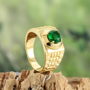 Classic gold titanium steel ring with green oval gemstone and textured band