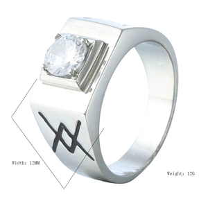 Detail view of 12mm wide silver men's ring with white zircon and black runes