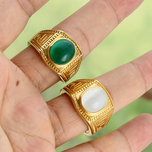 Gold titanium steel rings with green and white gems and vintage geometric carving