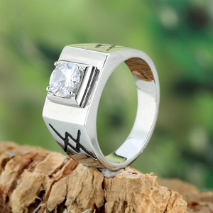 Men's silver steel ring with round zircon and black geometric engravings on wood