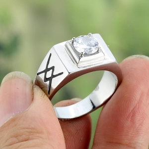 Men's square silver ring with a large round cubic zirconia center stone in a four-prong setting