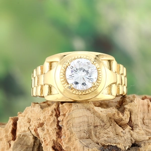 Macro view of a gold titanium ring with a large center stone and link-style band