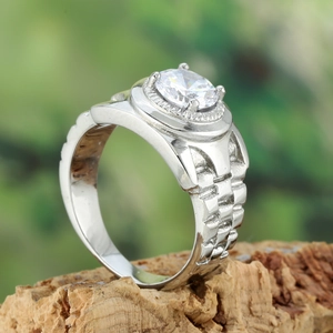 Classic silver titanium steel ring with large round solitaire diamond on wood background