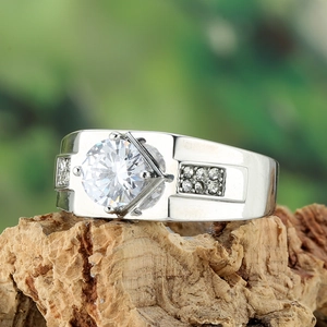 Fashionable men's titanium wide ring with round cut center stone on natural wood