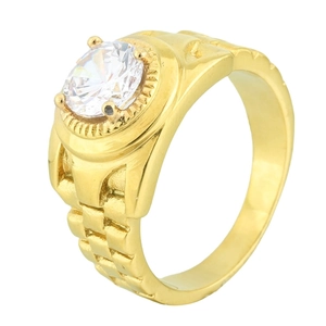 Detail view of the industrial gold plated titanium ring featuring band texture and clear zircon