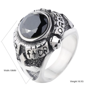 Punk vintage stainless steel ring with black faceted gemstone and skull details