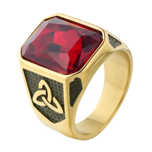 Vintage gold Viking Celtic ring for men with a large red gemstone and Triquetra relief