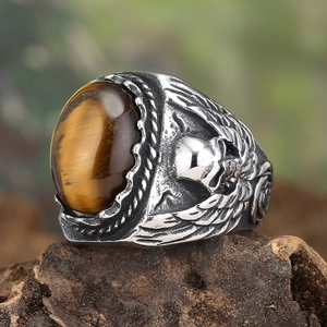 Vintage punk men's tiger eye ring with carved skull patterns on distressed steel