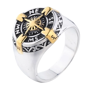 Vintage stainless steel compass ring with gold star and engraved nautical directions