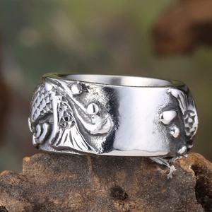 Vintage style wide silver stainless steel ring with embossed carp and wave patterns