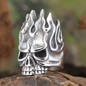 Retro stainless steel skull ring with flame design and black vintage finish on stone